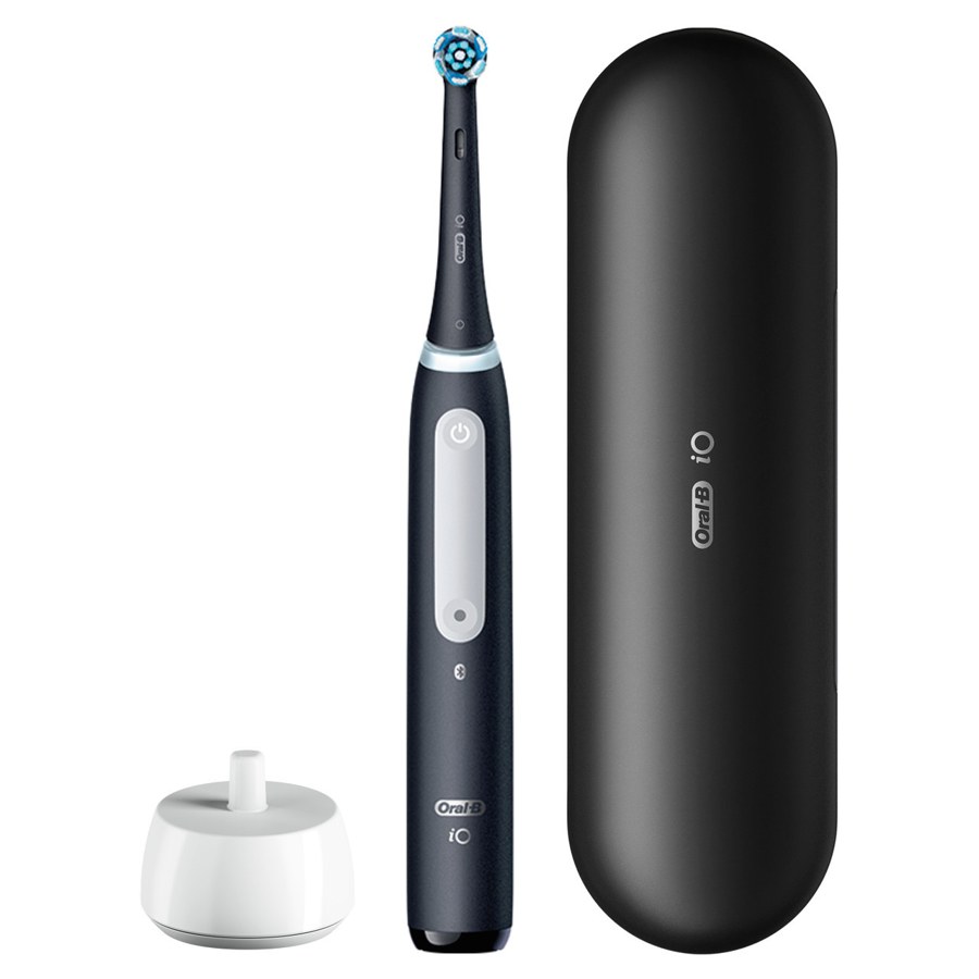 Oral-B iO Series 3 handle in matte black with a white charger and a black travel case