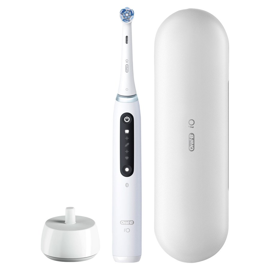 Oral-B iO Series 5 handle in white with a round brush head, shown with Oral-B's charger and case