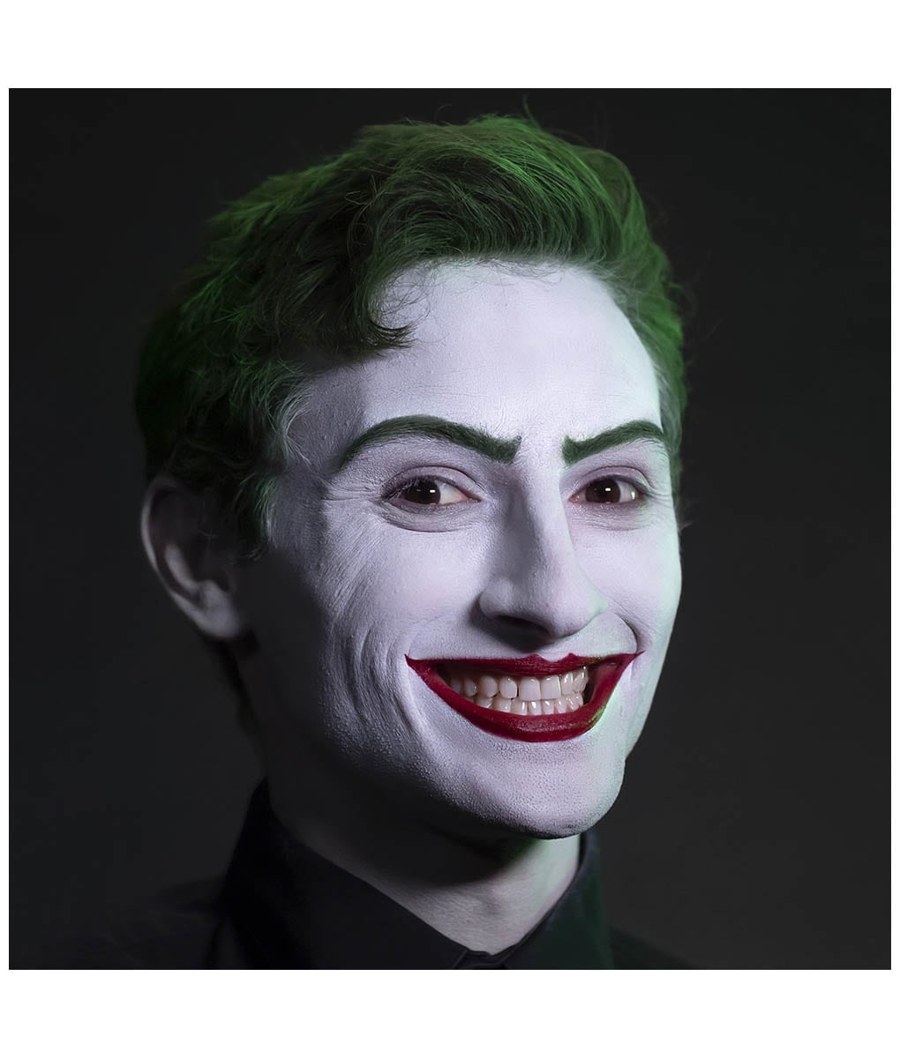 The finished Classic Chaos Clown look: white face, green brows and hair, red smile