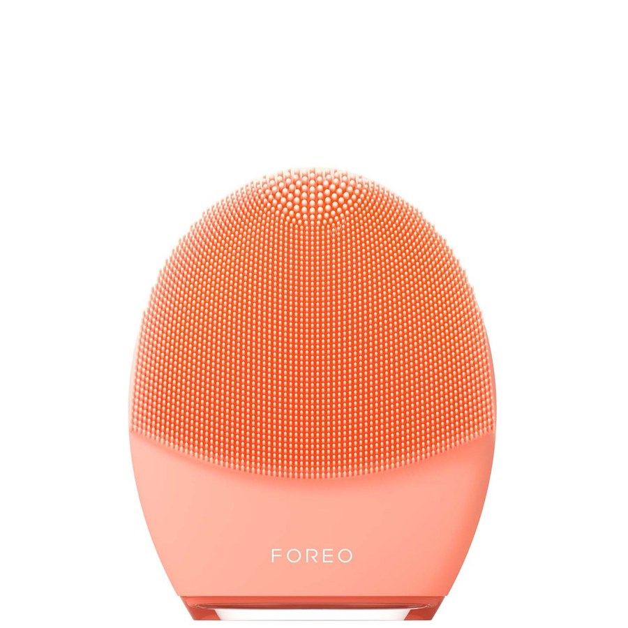 FOREO LUNA 4 for balanced skin in apricot, front view with its silicone touchpoints